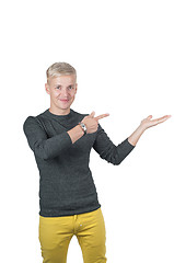 Image showing Man in yellow and gray pointing with his fingers