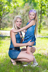 Image showing Blond woman with girl