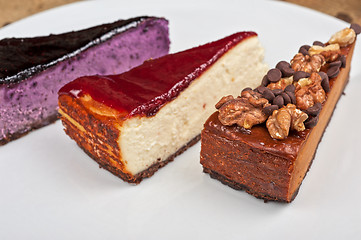 Image showing cheesecake with chocolate and nuts