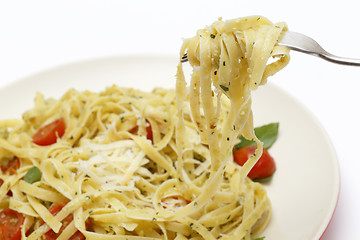 Image showing Pesto tagliatelle on a fork