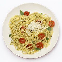 Image showing Tagliatelle with pesto and tomatoes from above