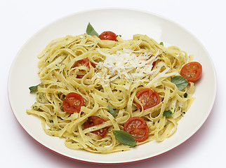 Image showing Tagliatelle with pesto and tomatoes