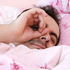 Image showing Young man sleeping .