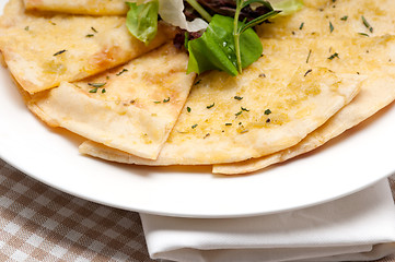 Image showing garlic pita bread pizza with salad on top