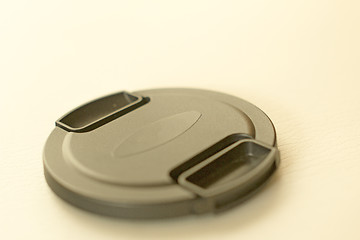 Image showing Lens cap isolated on a white background blurred.