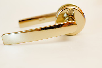 Image showing Nickel-plated door handle on a white background.