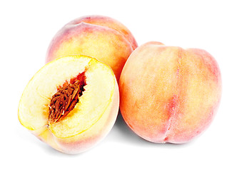 Image showing juicy peach on a white background 