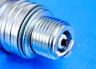 Image showing spark-plug  on the  blue  background