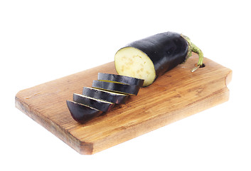 Image showing sliced eggplant on a cutting board  isolation on white 