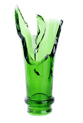 Image showing broken green wine bottle isolated on the white background 