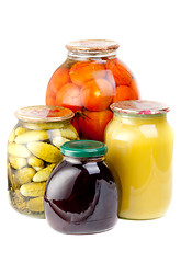 Image showing Home made preserves   and honey isolation  on  white