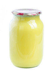 Image showing honey in glass jar isolated  