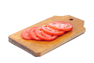 Image showing sliced fresh red tomatoes isolated on white background 
