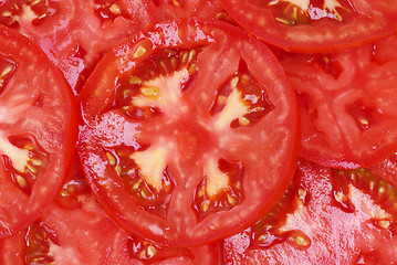 Image showing fresh red tomato sliced as background 