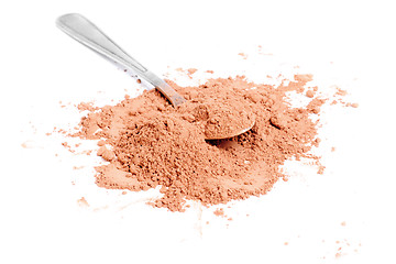 Image showing Cocoa  powder  and  steel  spoon  isolation on  white