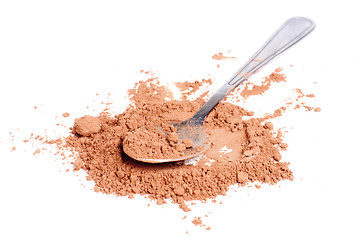 Image showing Cocoa  powder  and  steel  spoon  isolation on  white