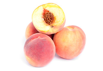 Image showing whole and sliced peach isolation on white 