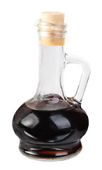 Image showing Small decanter with balsamico vinegar  isolated on the  white background