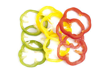 Image showing red,green, yellow sliced pepper isolated on white background 