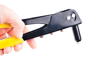 Image showing Riveters in a hand on a white background 