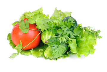 Image showing Green salad and fresh vegetables  isolated on white background 