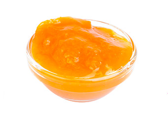 Image showing apricots jam  in  glass  isolation on  white