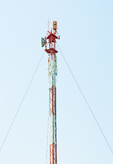 Image showing Telecommunications tower with different antenna  on blue sky background   