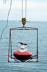 Image showing jet ski lift for dry storage   on the sea  background