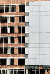 Image showing Office building construction site. Thermal insulation of walls 