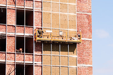 Image showing Office building construction site. Thermal insulation of walls