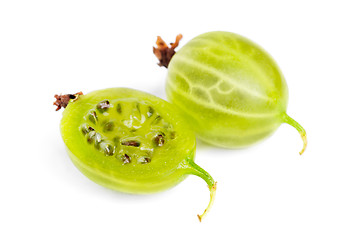 Image showing Whole and sliced green gooseberry fruit closeup with seed on white background 