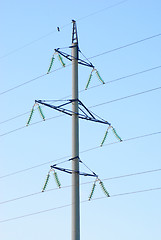 Image showing High voltage electricity pillars  on the blue  sky background 