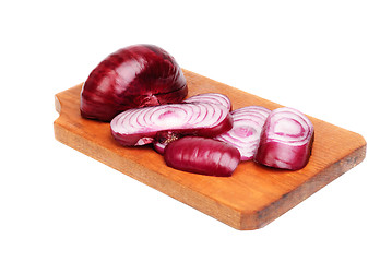Image showing sliced purple onions on cutting board isolated on white 