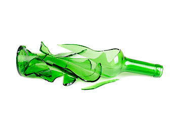 Image showing Shattered green wine bottle isolated on the white background 