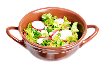 Image showing fresh salad with radishes, lettuce and onions on  bowl isolated on white