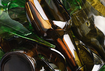 Image showing Waste glass.Recycled.Shattered green and brown bottle 