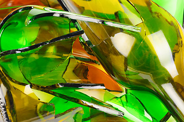 Image showing Waste glass.Recycled.Shattered green and brown bottle  background.