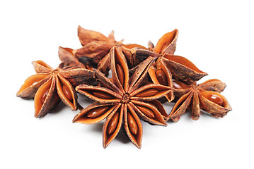 Image showing Some fresh anise-star, nature spice isolated on white background