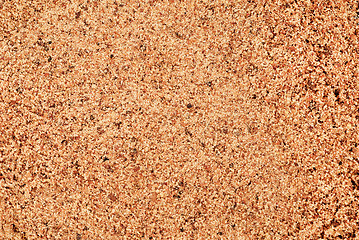 Image showing Nutmeg ground (Myristica fragrans) texture, full frame background. Used as a spice and medicine. 