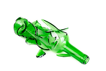 Image showing Shattered green wine bottle isolated on the white background 