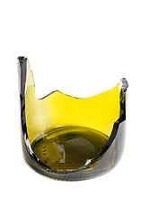 Image showing Shattered green wine bottle isolated on the white background 