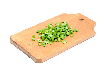 Image showing fresh sliced onions on cutting board isolated on white 