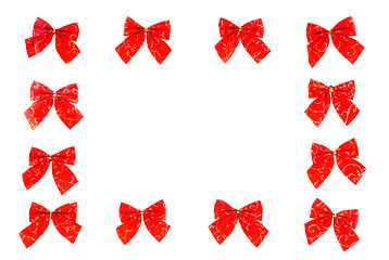 Image showing 12   of red ribbons  as  frame isolation  on white