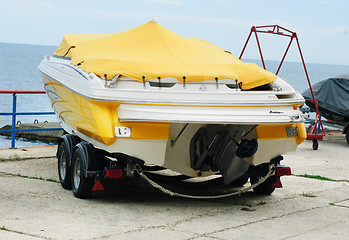 Image showing Boat on a trailer  on the  sea and  sky  background