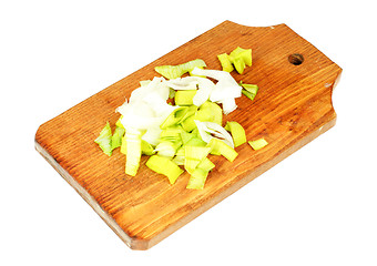 Image showing Fresh leek on  cutting board isolation on white background