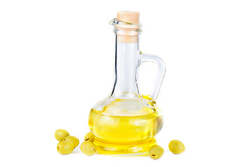 Image showing olives and a small decanter of olive oil isolated on white 