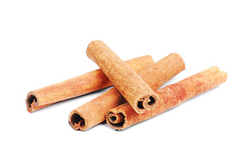 Image showing cinnamon sticks  isolated on white background 