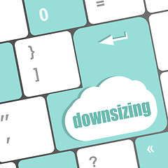 Image showing cloud icon with downsizing word on computer keyboard key