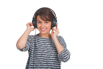 Image showing Pretty young girl listening music