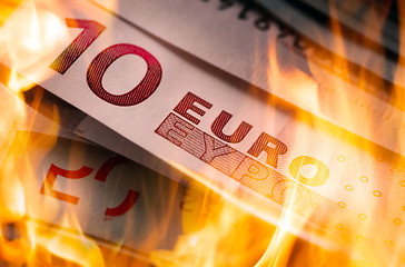 Image showing euro banknotes burning 